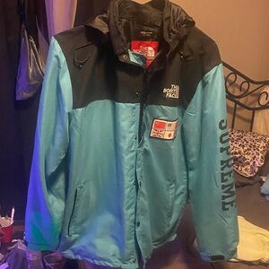 The North Face Teal and Black Performance Jacket